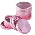 Black Leaf Alu-Kräutermühle mit changierendem Polyedermuster in Pink-Rot